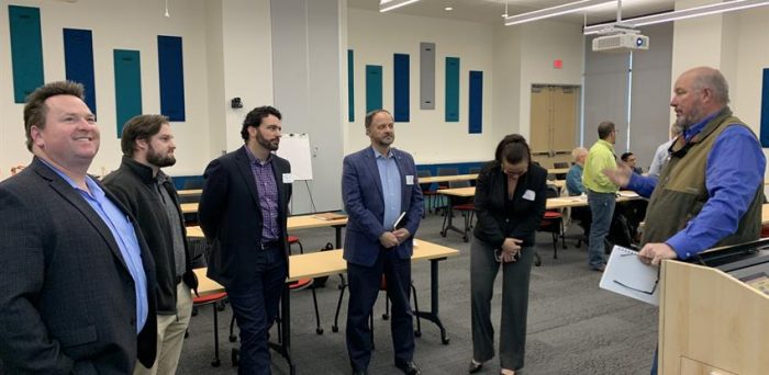 Quality Manager Hugh Brightwell (first from right) recently attended the Commercial Construction IAB board and committee meeting at the University of Houston.